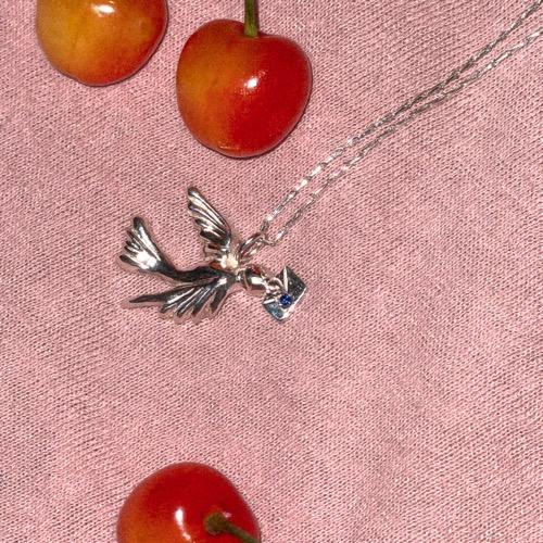 Homing pigeon necklace silver