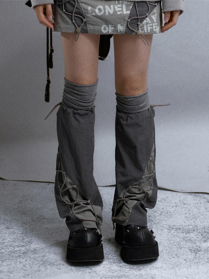 Cest Nous String leg warmer