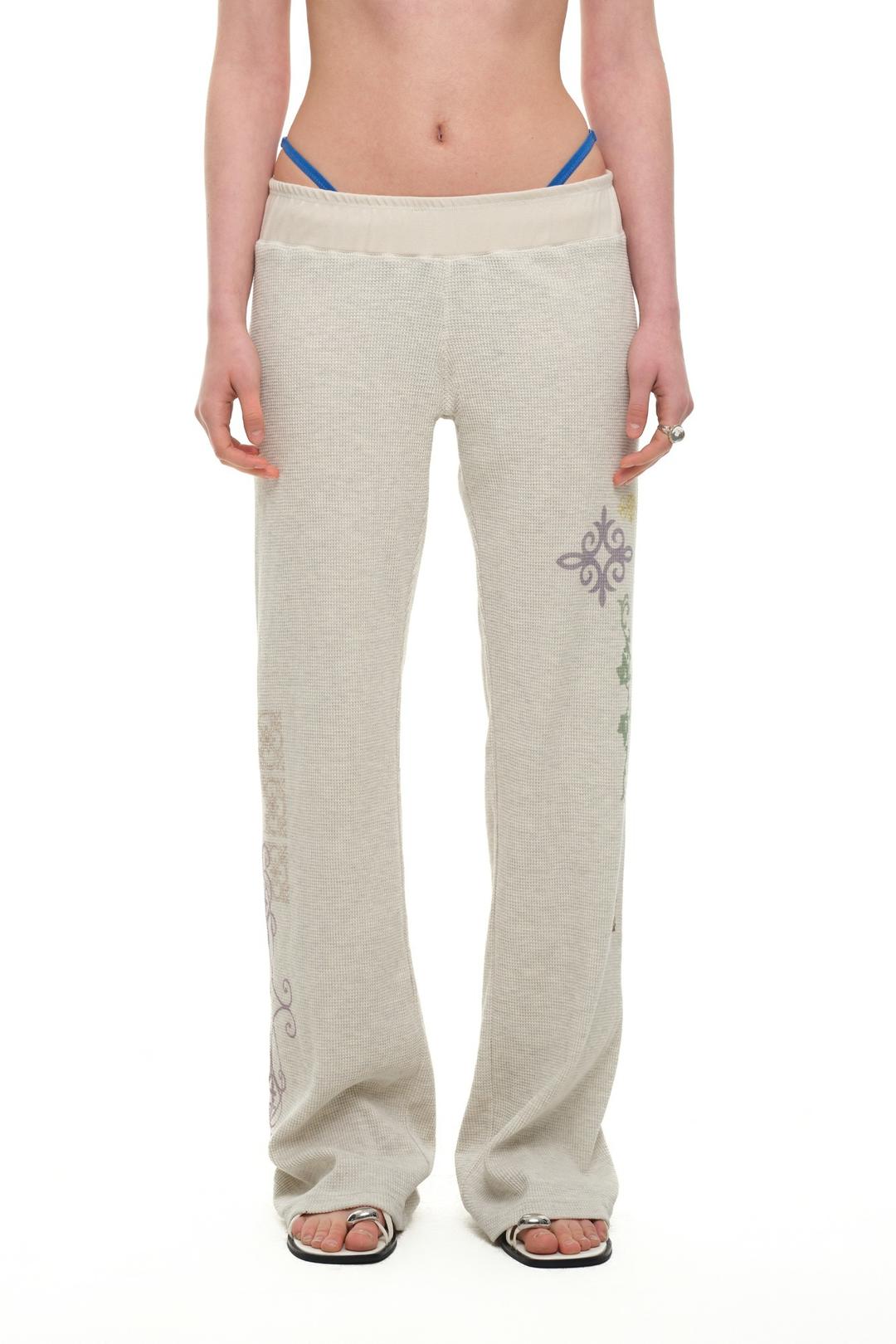 [3. 9 예약 발송] FOLK PATTERN SLIM-FIT WAFFLE PANTS (IVORY)