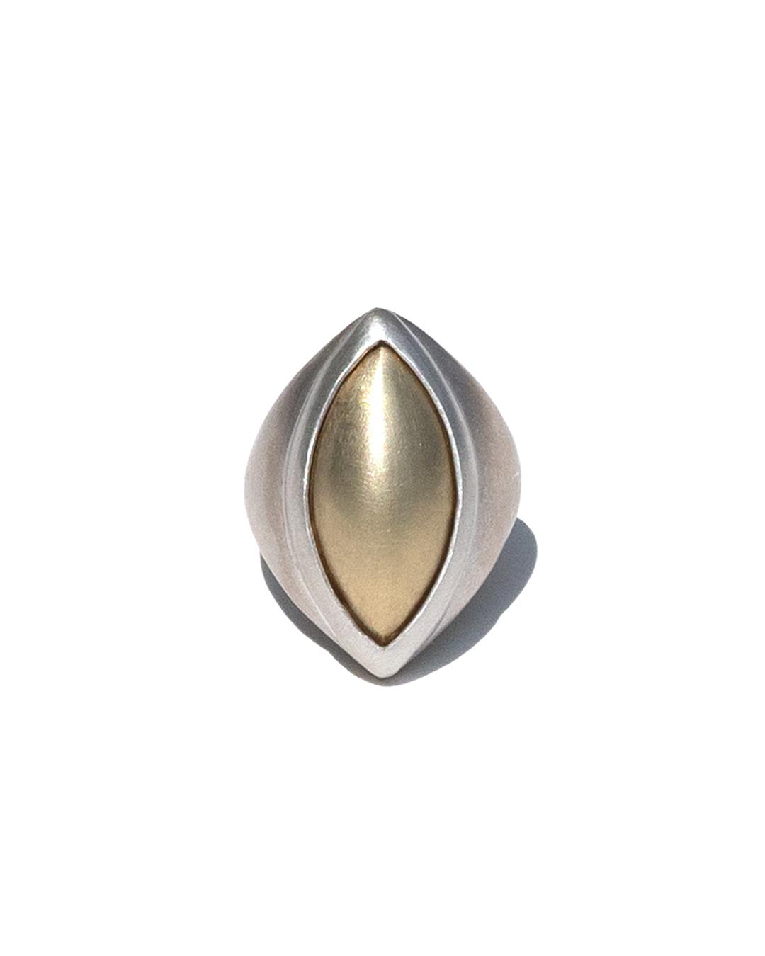 between seed ring (brass seed)