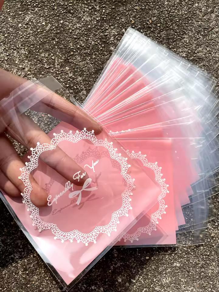100pcs 핑크 스퀘어 선물 포장 Opp 자체 밀봉 가방, 사랑스러운 활 인쇄 Opp 자체 밀봉 가방, 선물 사탕 포장 가방