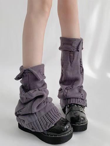 Subculture knitting pair piles of leg covers