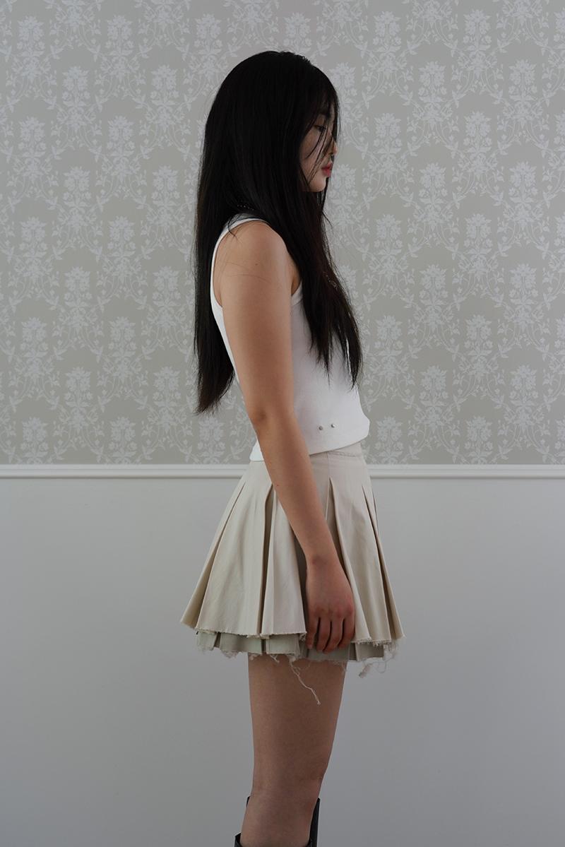 IRREGULAR CUT OFF SKIRT IN ECRU/OLIVE