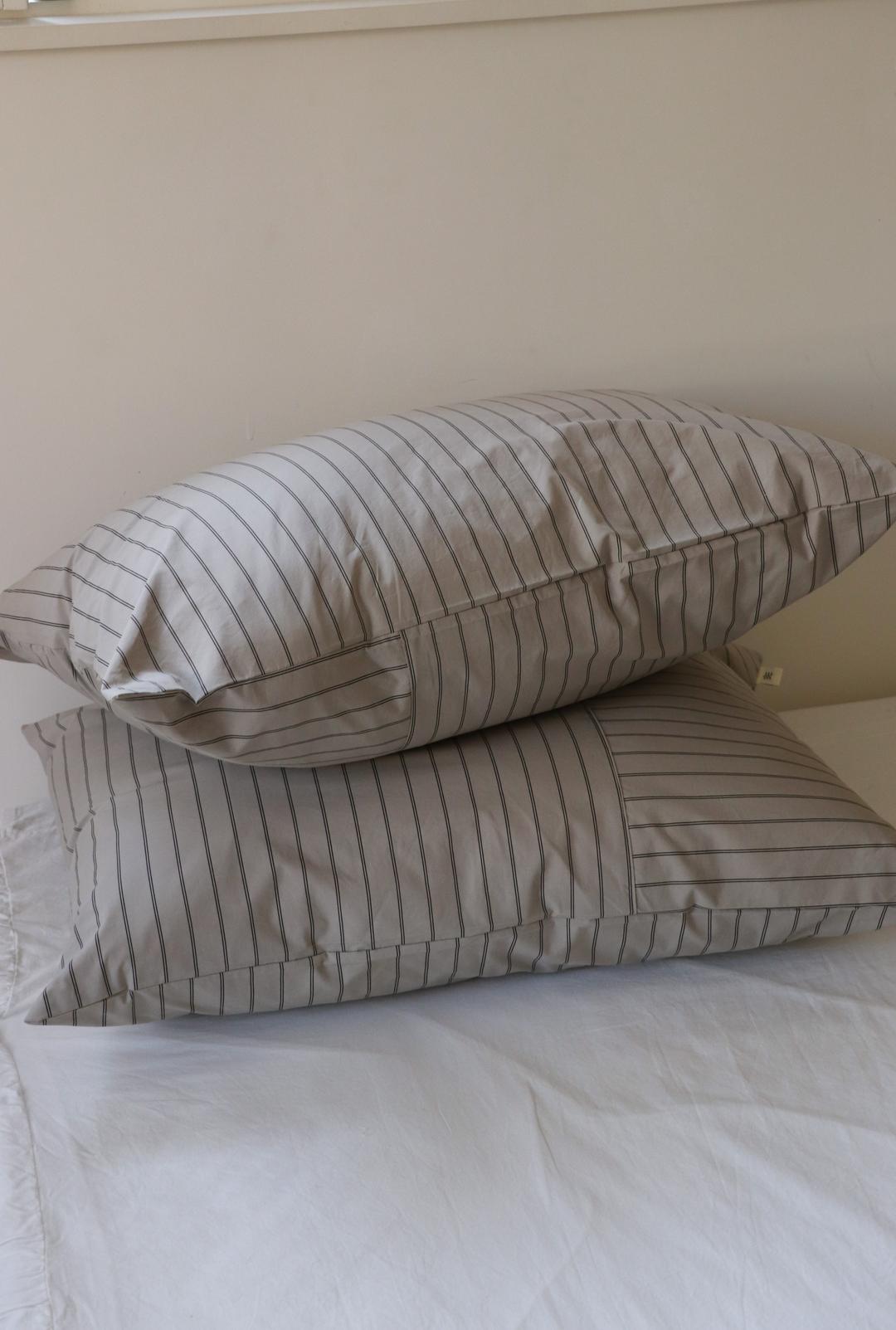 Beige patch pillow cover