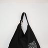 black dot pocket hobo bag