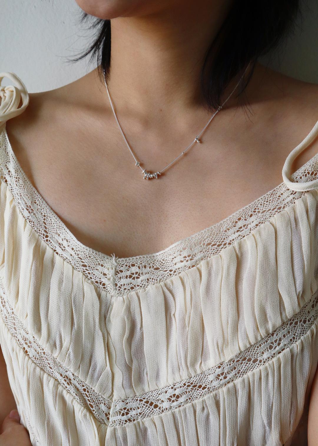 soil necklace