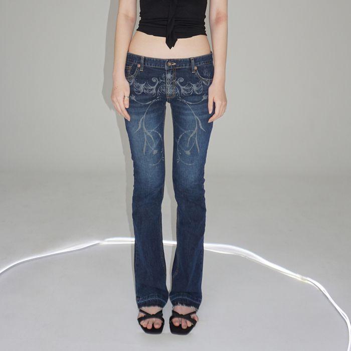 tatoooed hiphugger denim