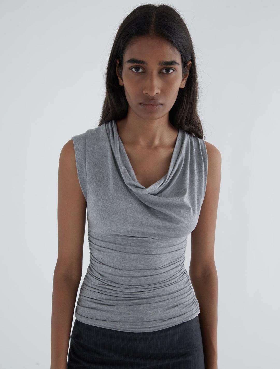 SERAFIN-Sleeveless top with a draped neckline and asymmetric shoulders