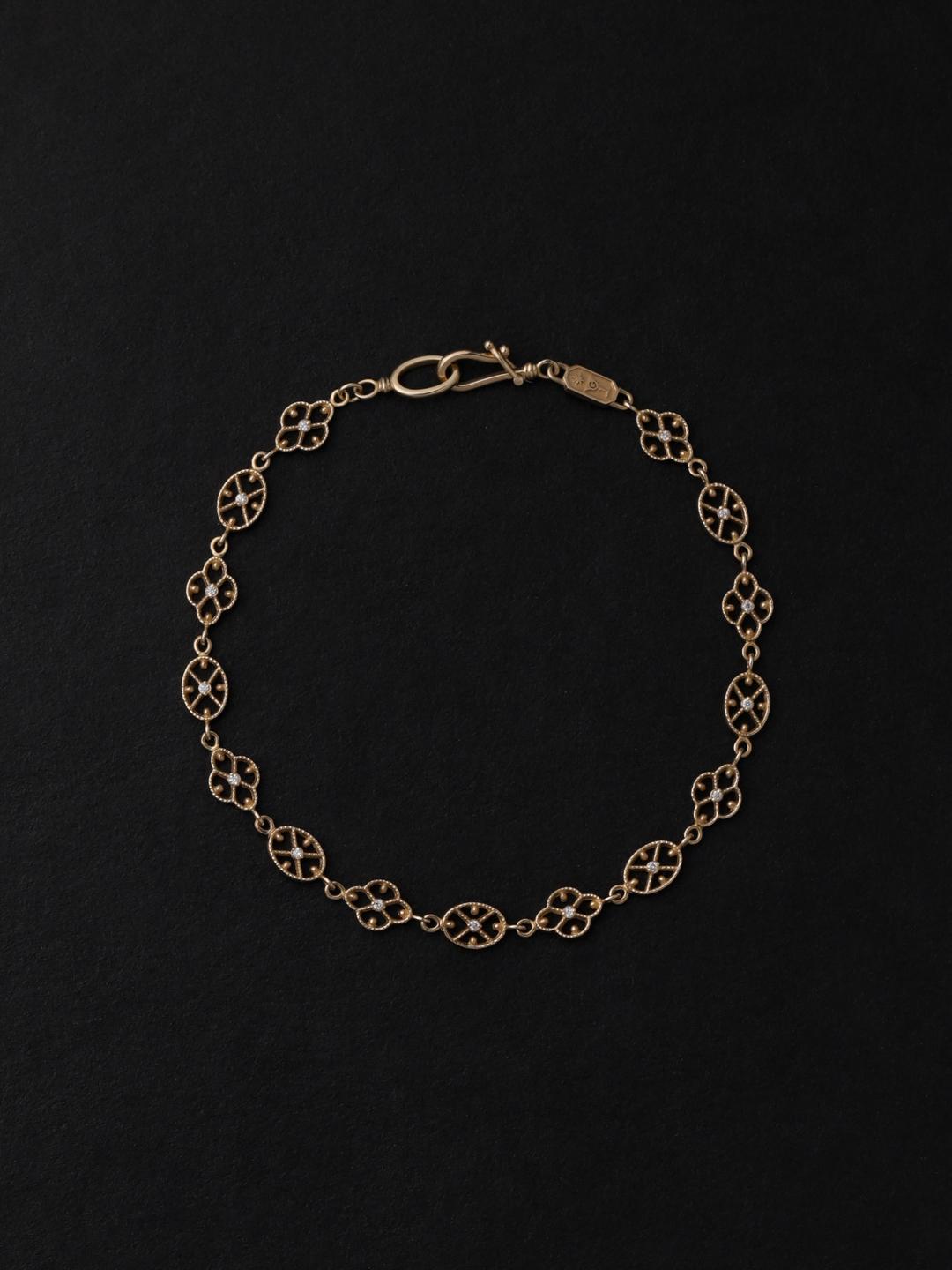 filigree ornament unit bracelet.