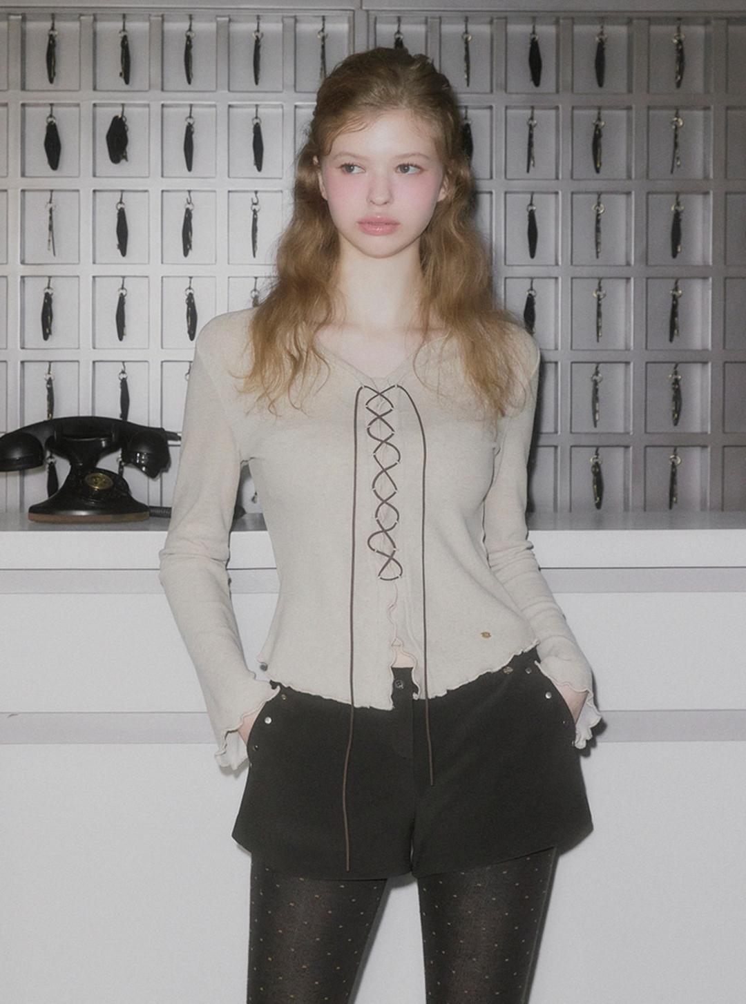 [온라인단독] 티버 프릴 코르셋 긴팔 티셔츠