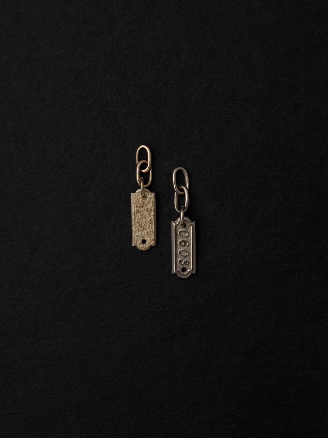 number tag pendant.