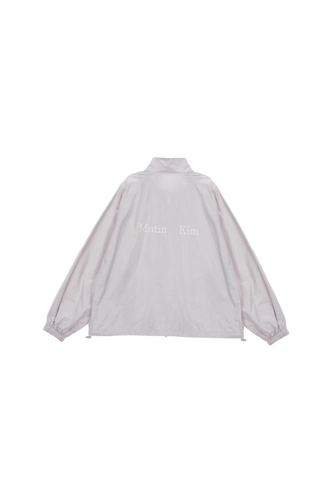 MATIN KIM LOGO COATING JUMPER IN GREY