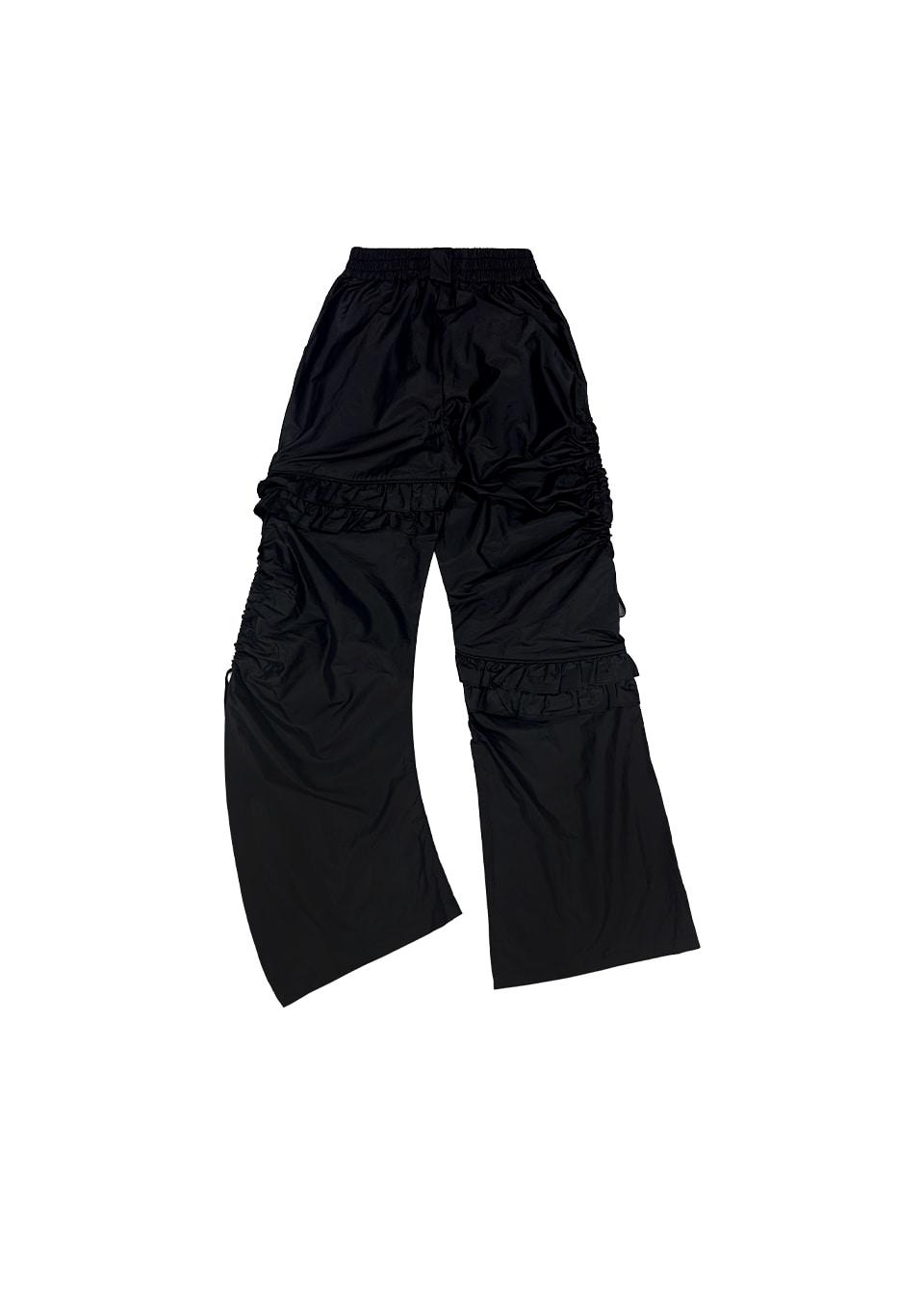 사이드 홀 스트링 언발란스 프릴 팬츠 블랙SIDE HOLE STRING UNBALANCED FRILL PANTS BLACK