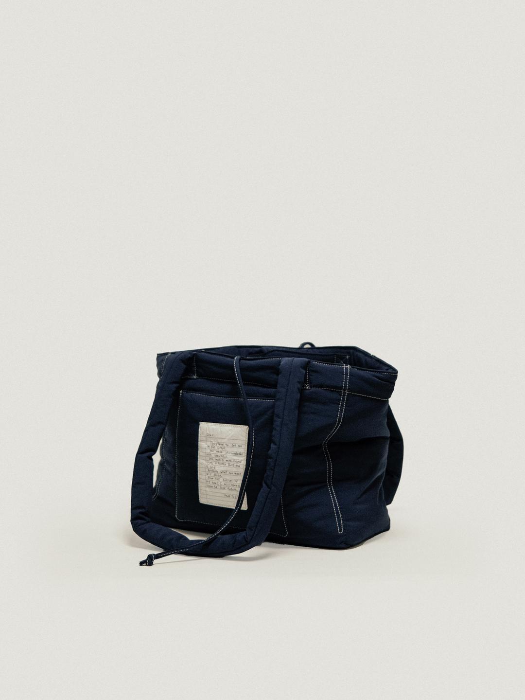 [10/16 예약배송] VINTAGE PADDING BAG - NAVY