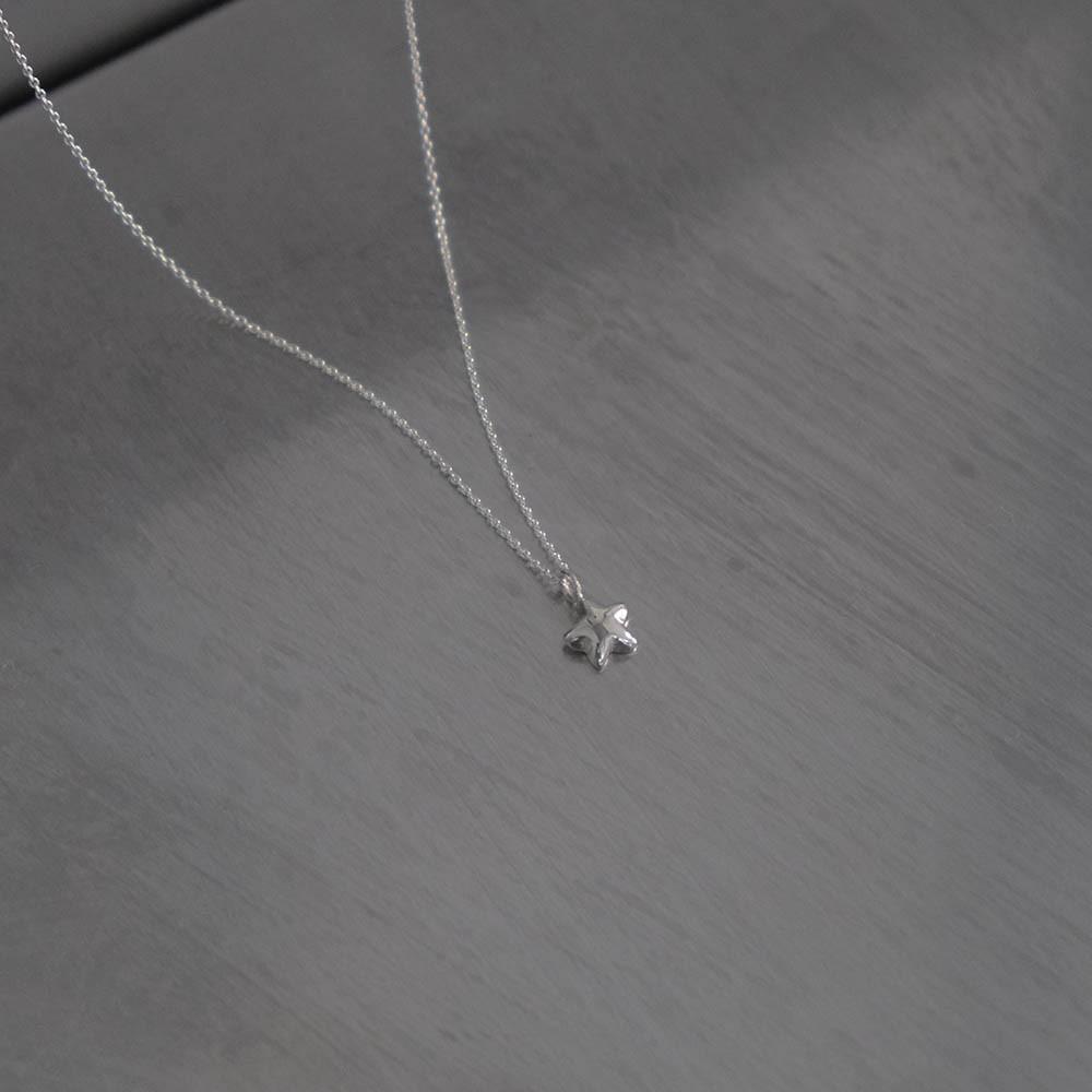 dwarf star necklace by Aube 바이오브 실버 별 목걸이