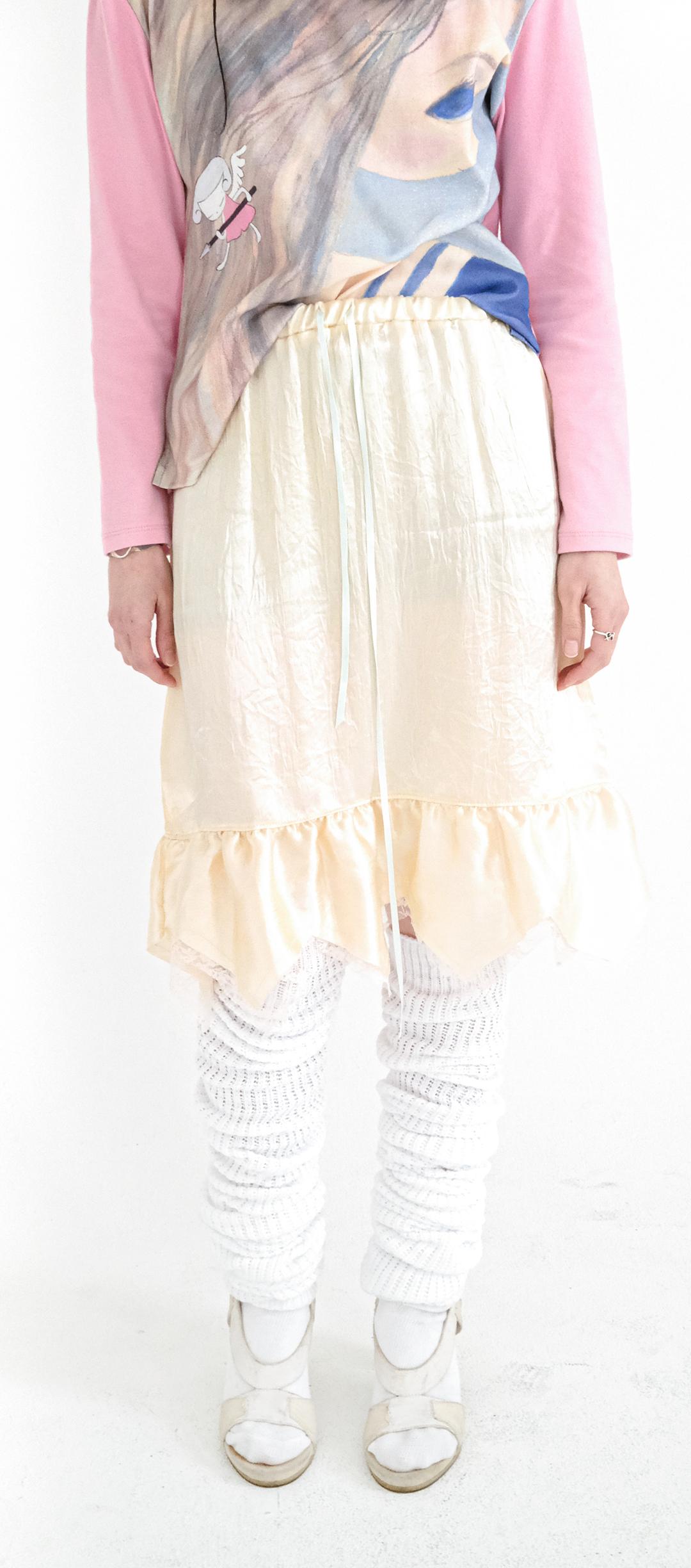 [fa.er.ie] pointed satin midi skirt (peach)