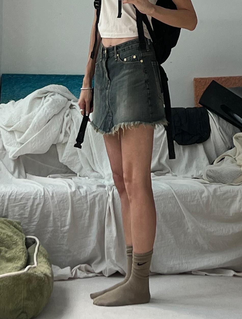 damaged vintage denim skirt
