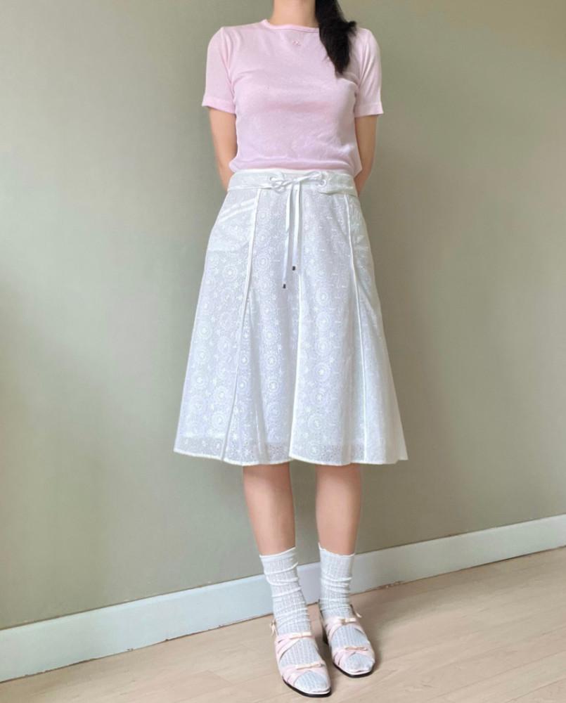 [중고] white embroidered punching skirt COURREGES