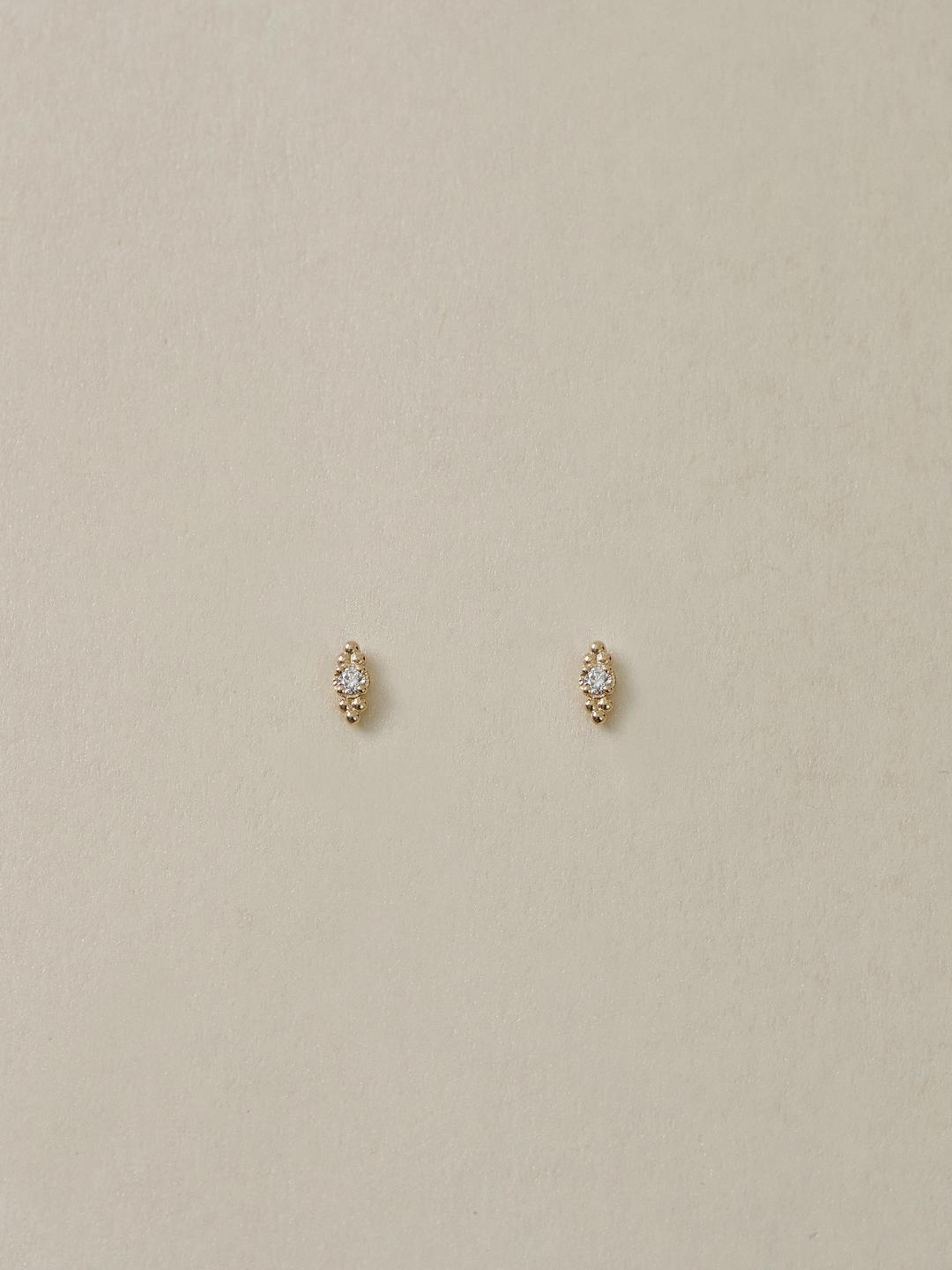 granules in marquise studs.