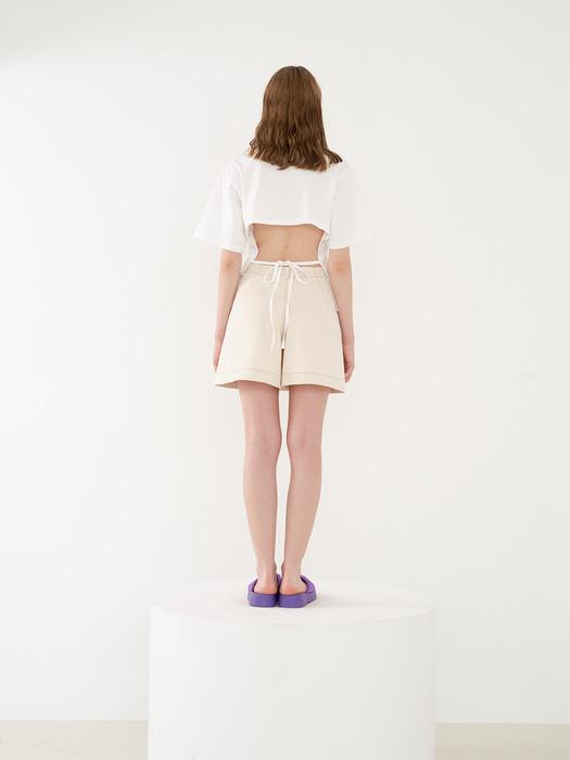 Stretch twill skirt shorts in cream