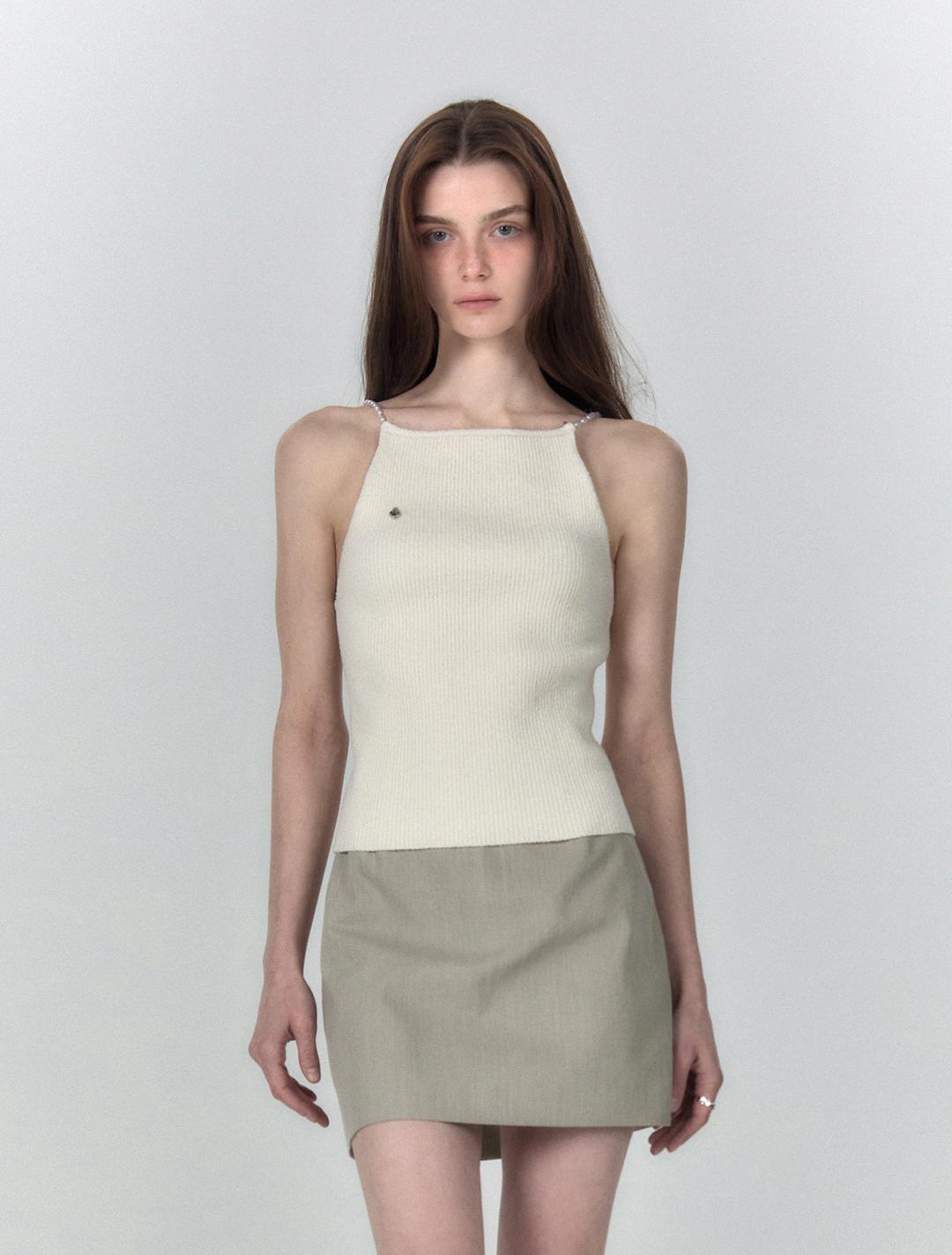 펄-엠벨리쉬드 슬리브리스 니티드 탑 (아이보리)