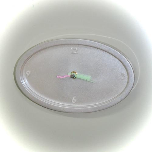 pearl bloom oval clock