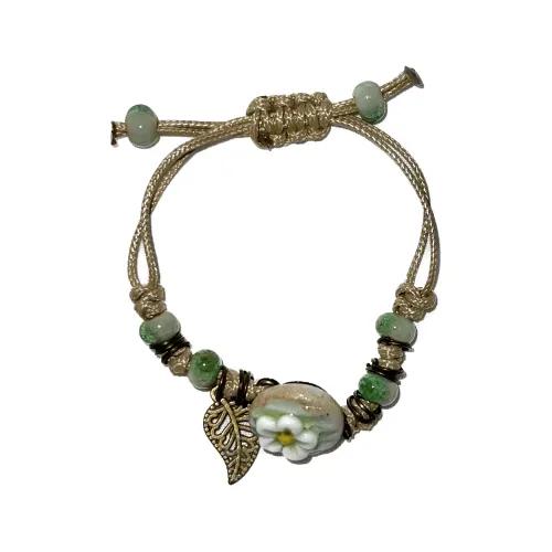 kiki. pottery flower shop in the forest bracelet