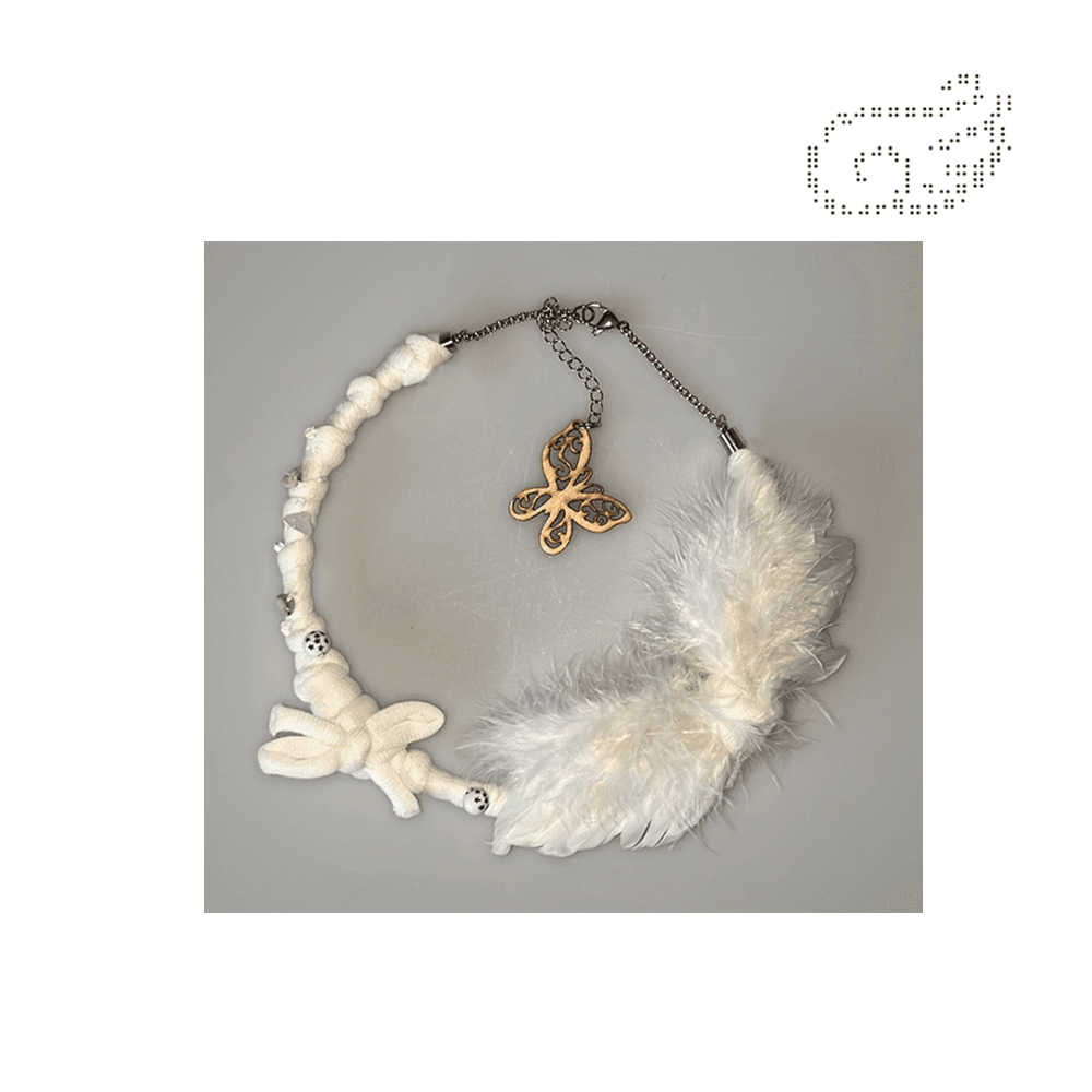 ଘ wing necklace ഒ