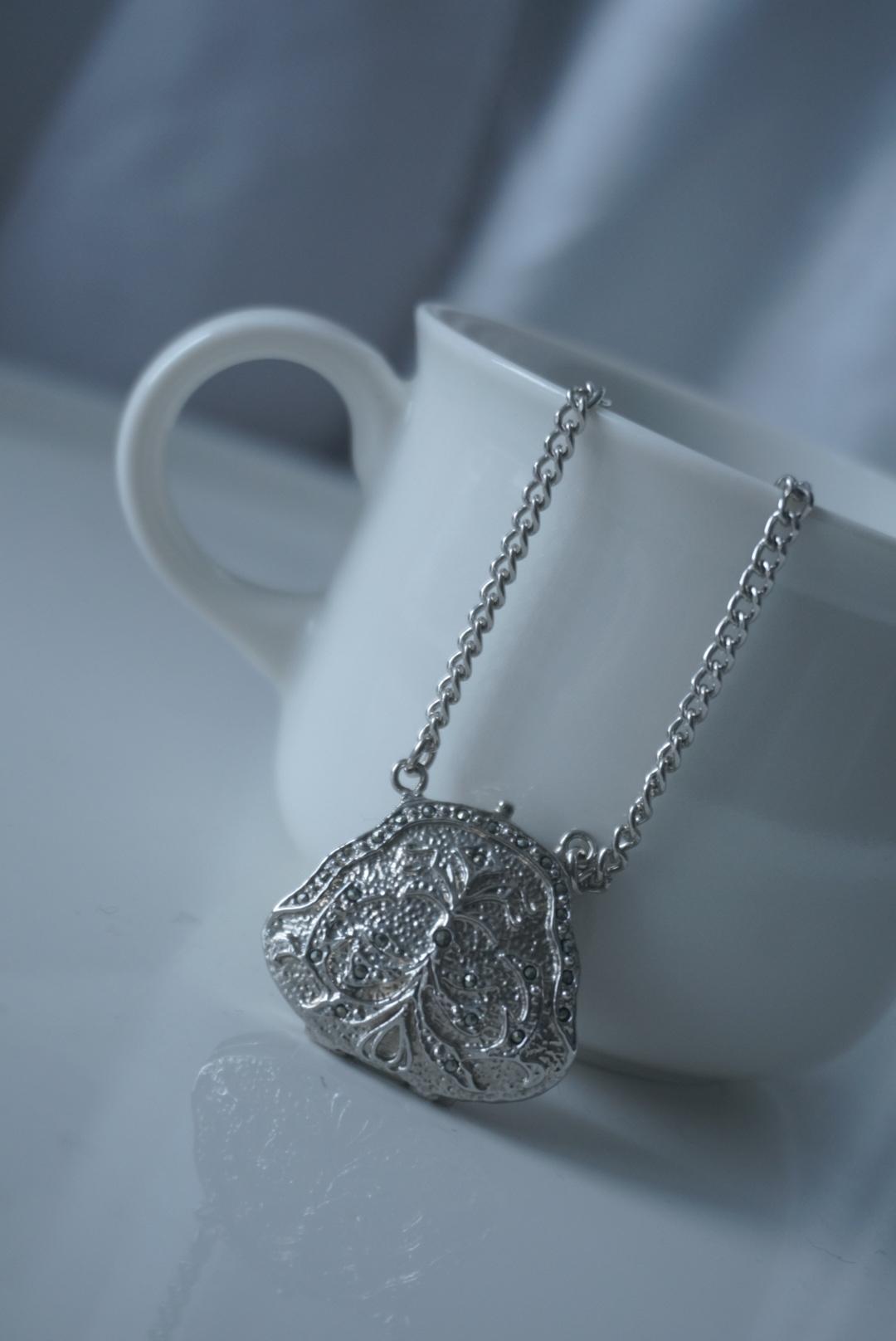 bag watch necklace
