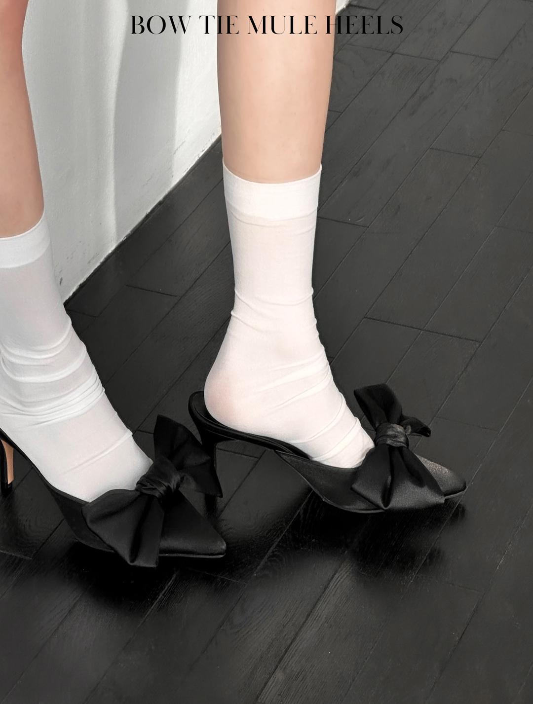 Bow tie mule heels