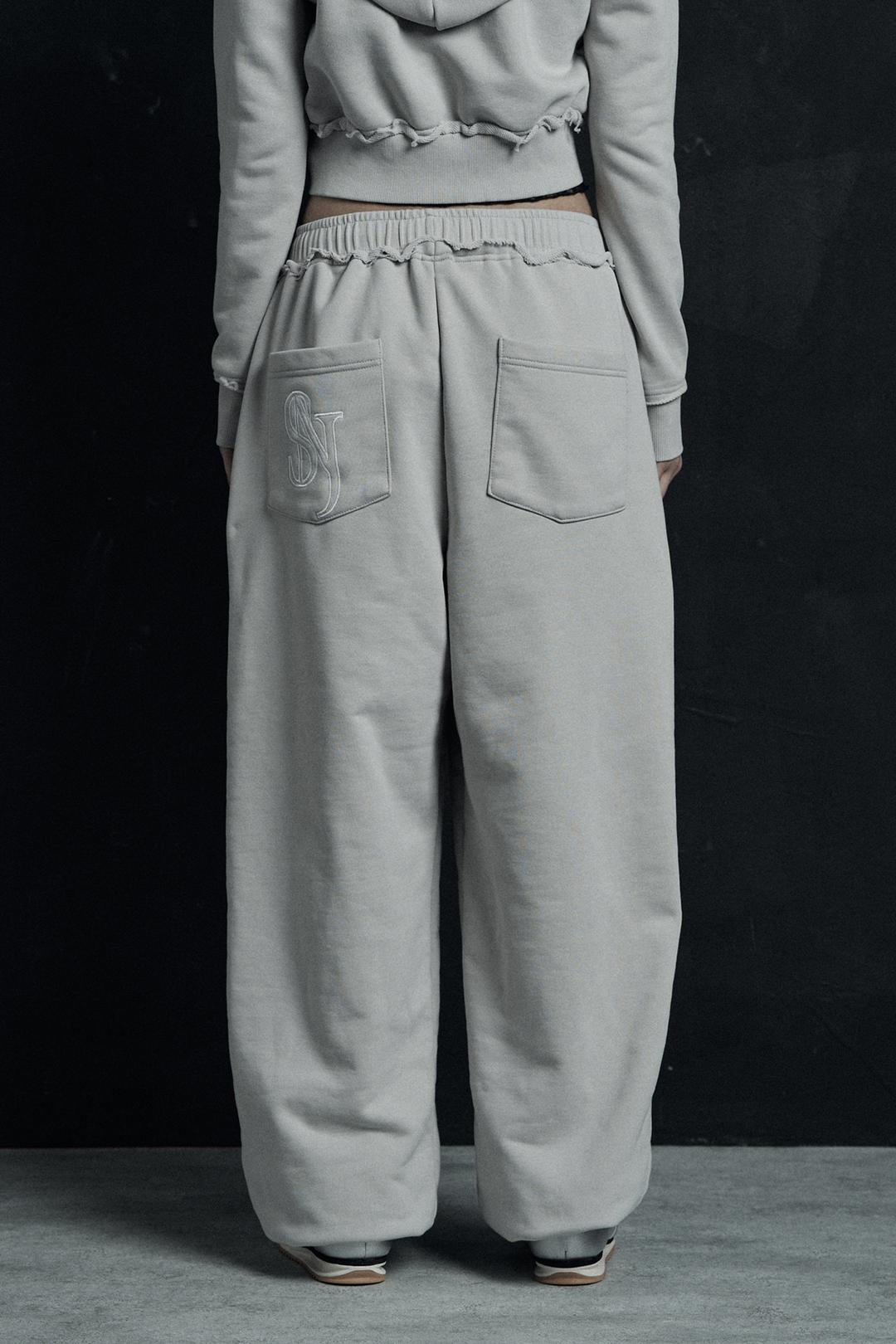 SNJ CUT-OFF SWEATPANTS WARM GRAY