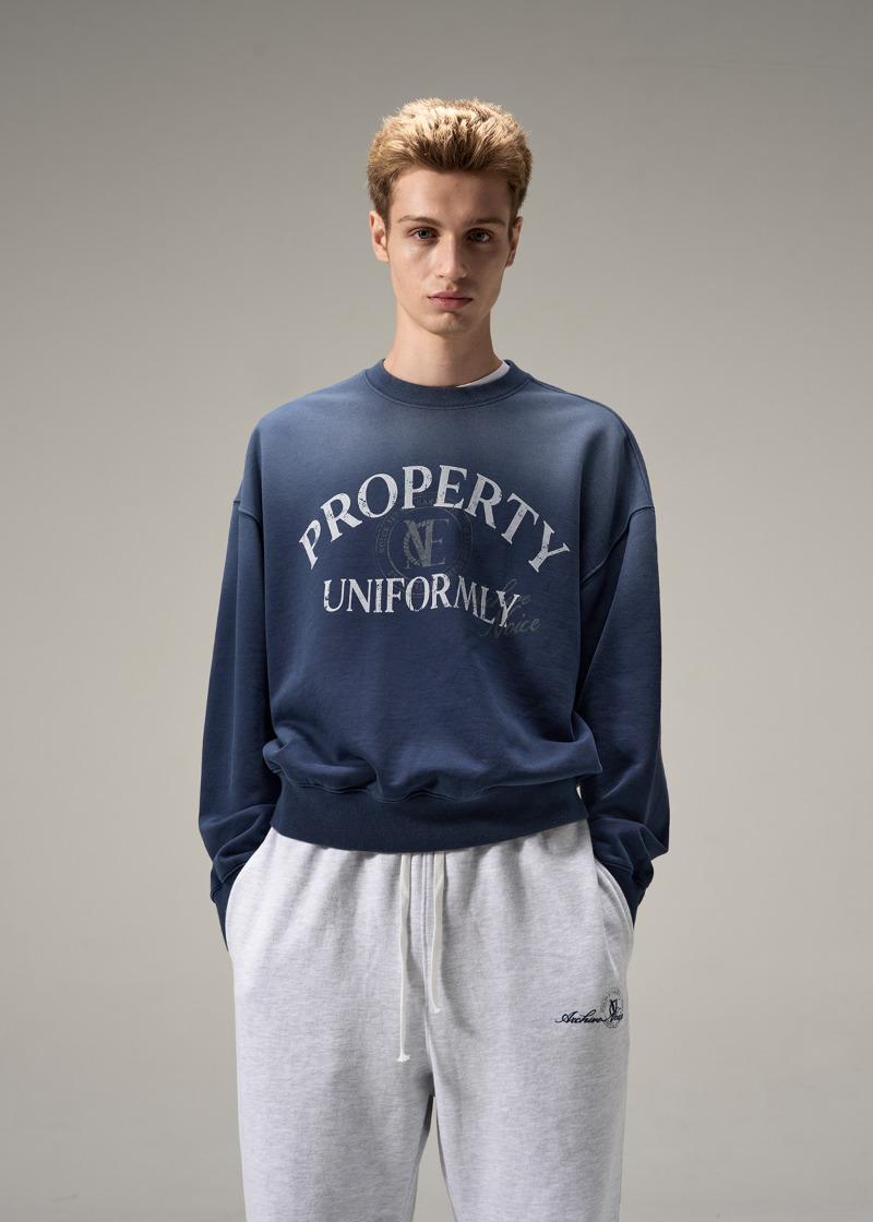 M PROPERTY EMBLEM SWEATSHIRT - BLUE