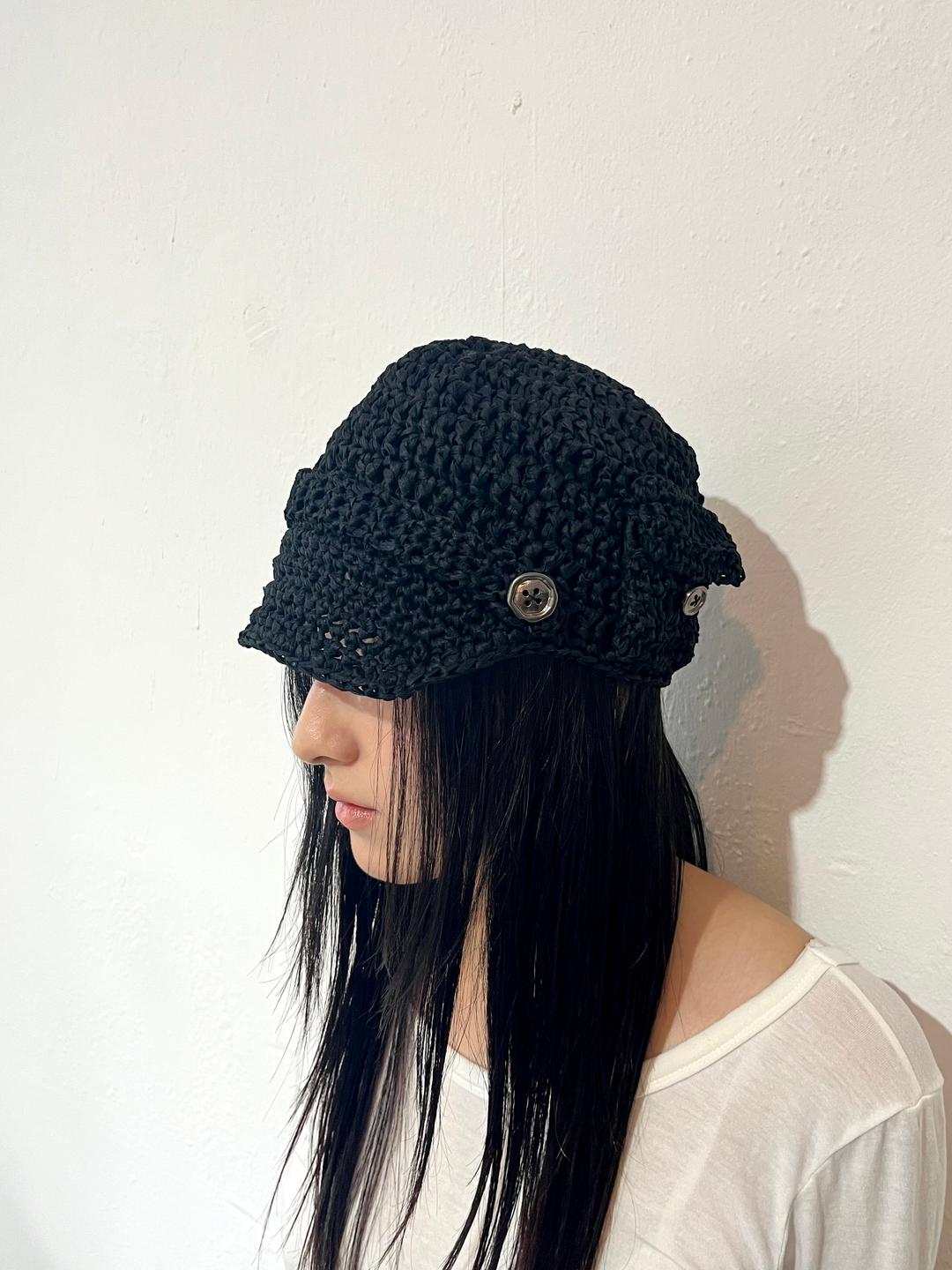 Black button pocket cap