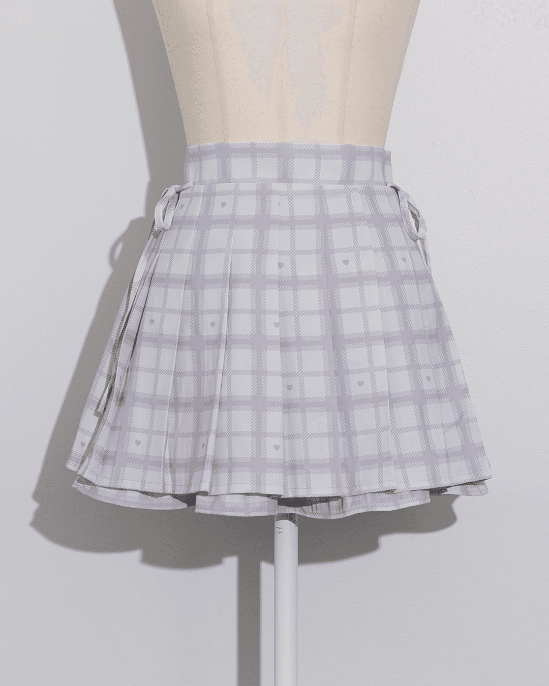 piumハートチェックサイドリボンプリーツスカート