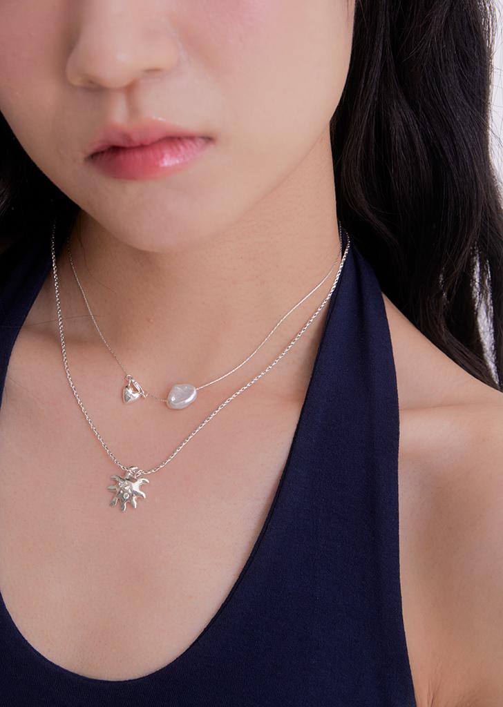 shy cheecked sun necklace