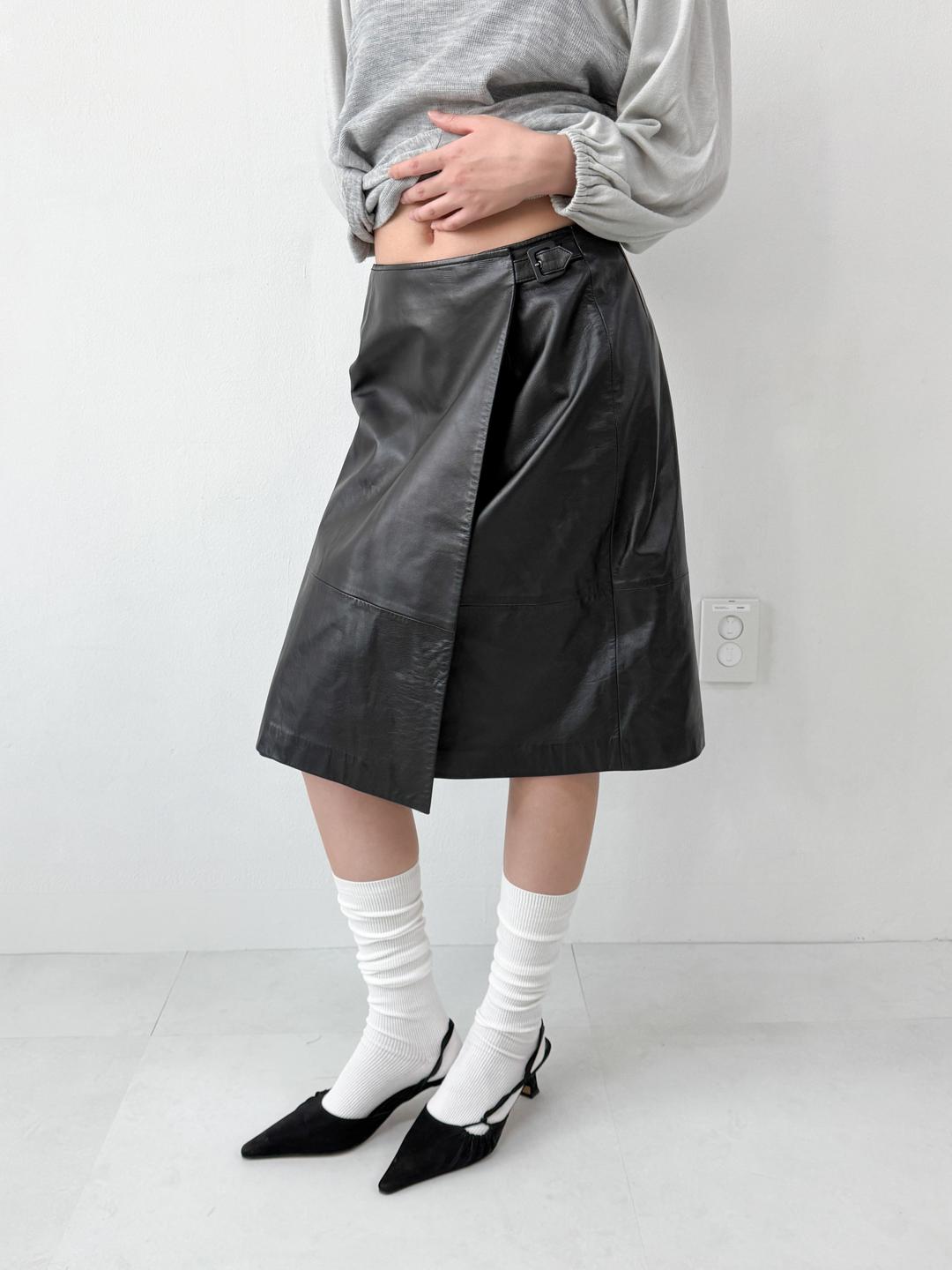 590. Wrap leather midi skirt