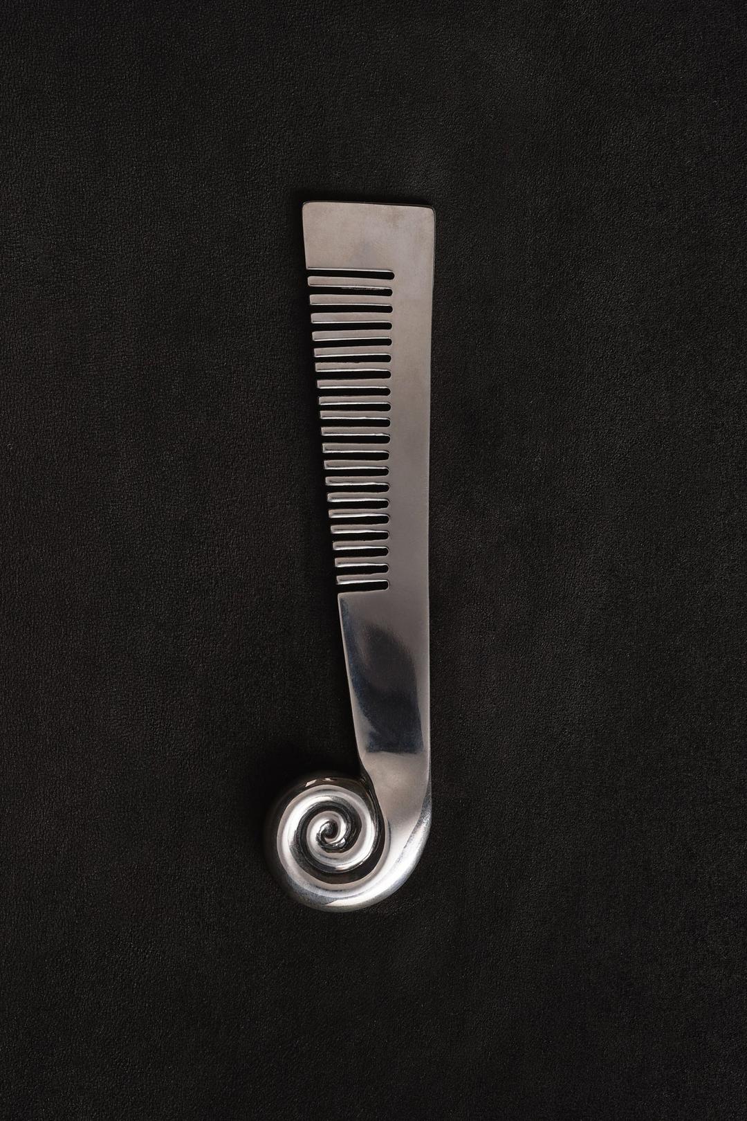 NAUTILUS COMB