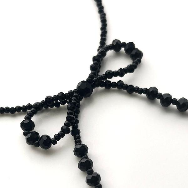 Black ribbon necklace