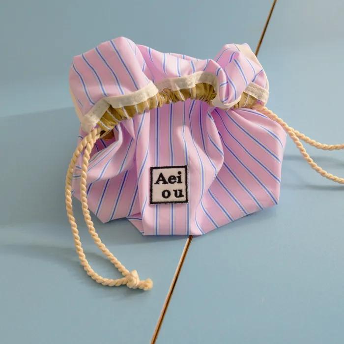 Aeiou String Pouch Pink Blue Stripe(Beige)