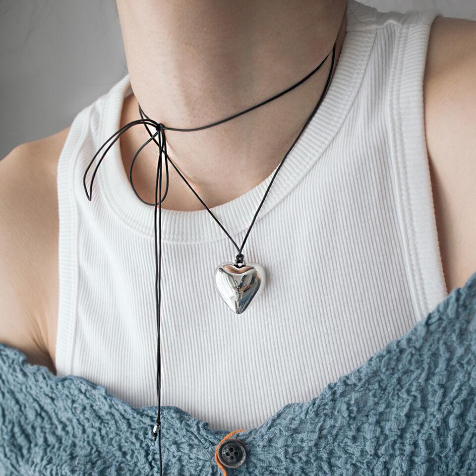 Big chubby heart with black string necklace