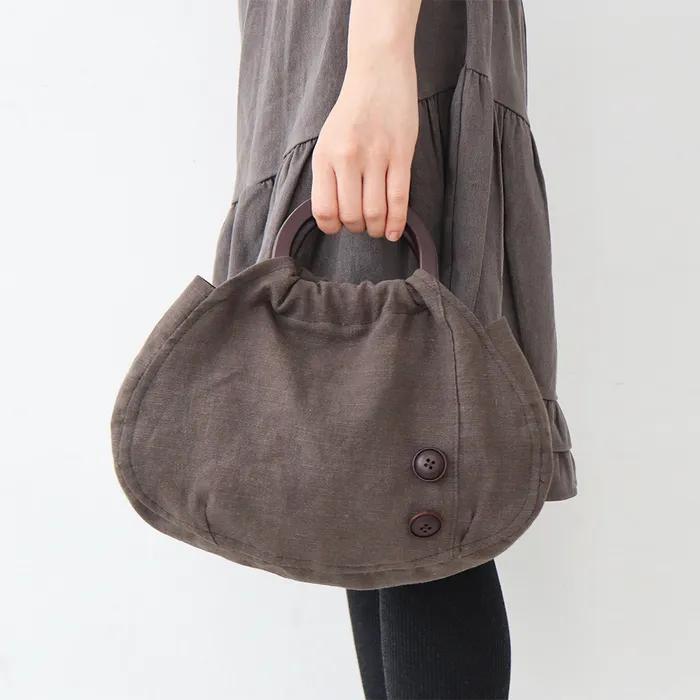 brown wood handle bag
