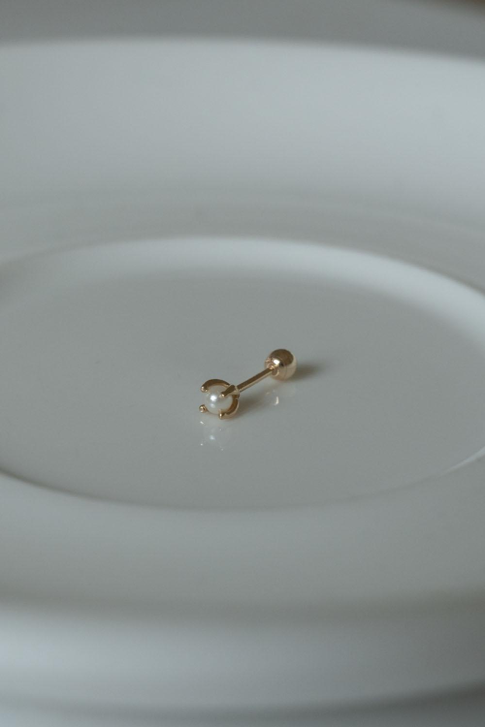 14k pearl barbell piercing