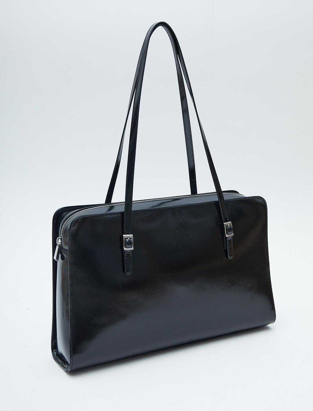 CAYE-Black bag crafted from structured leather