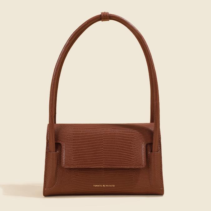 은은하게 세련된 감각 살린 숄더백