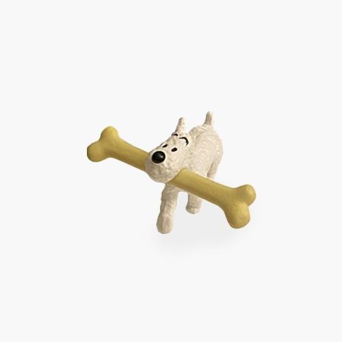 Snowy Walking With His Bone